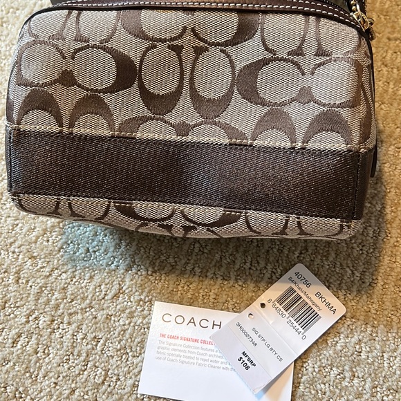 Coach Handbags - NWT Coach Signature Khaki/Mahogany Pouch Travel Bag